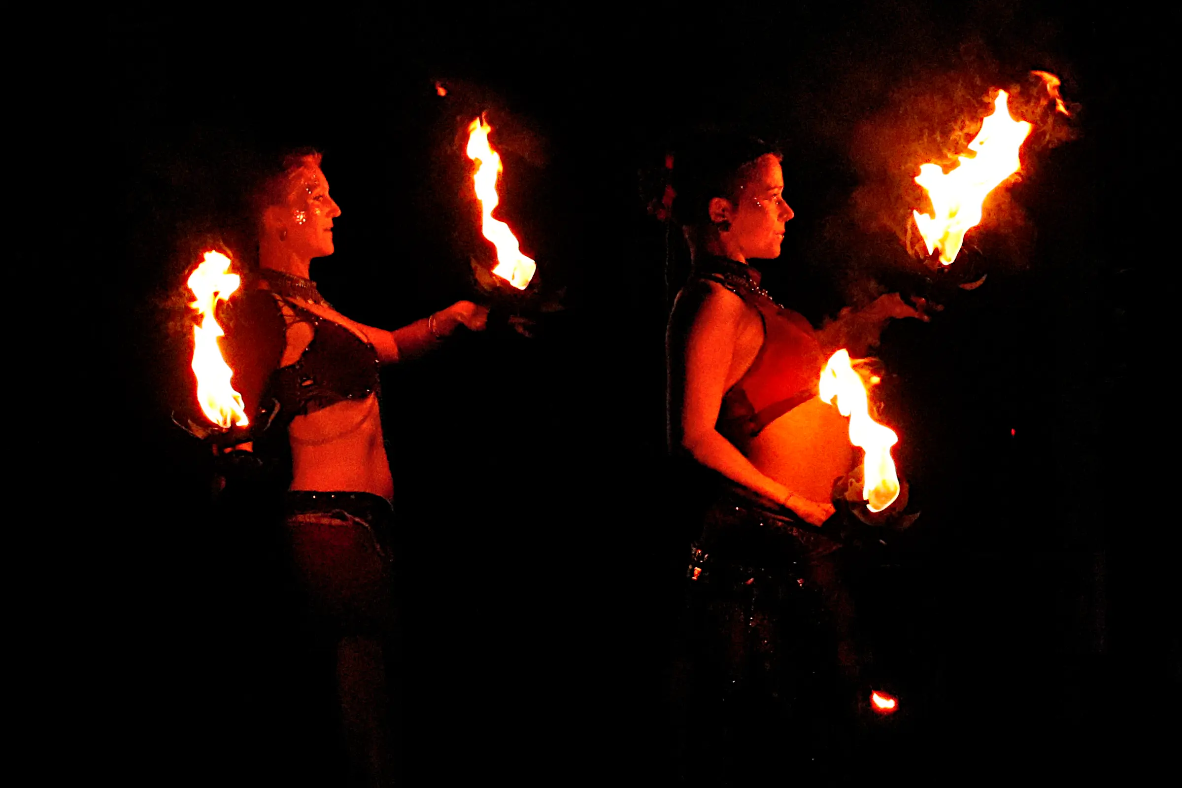 2 mensen aan het optreden met vuur